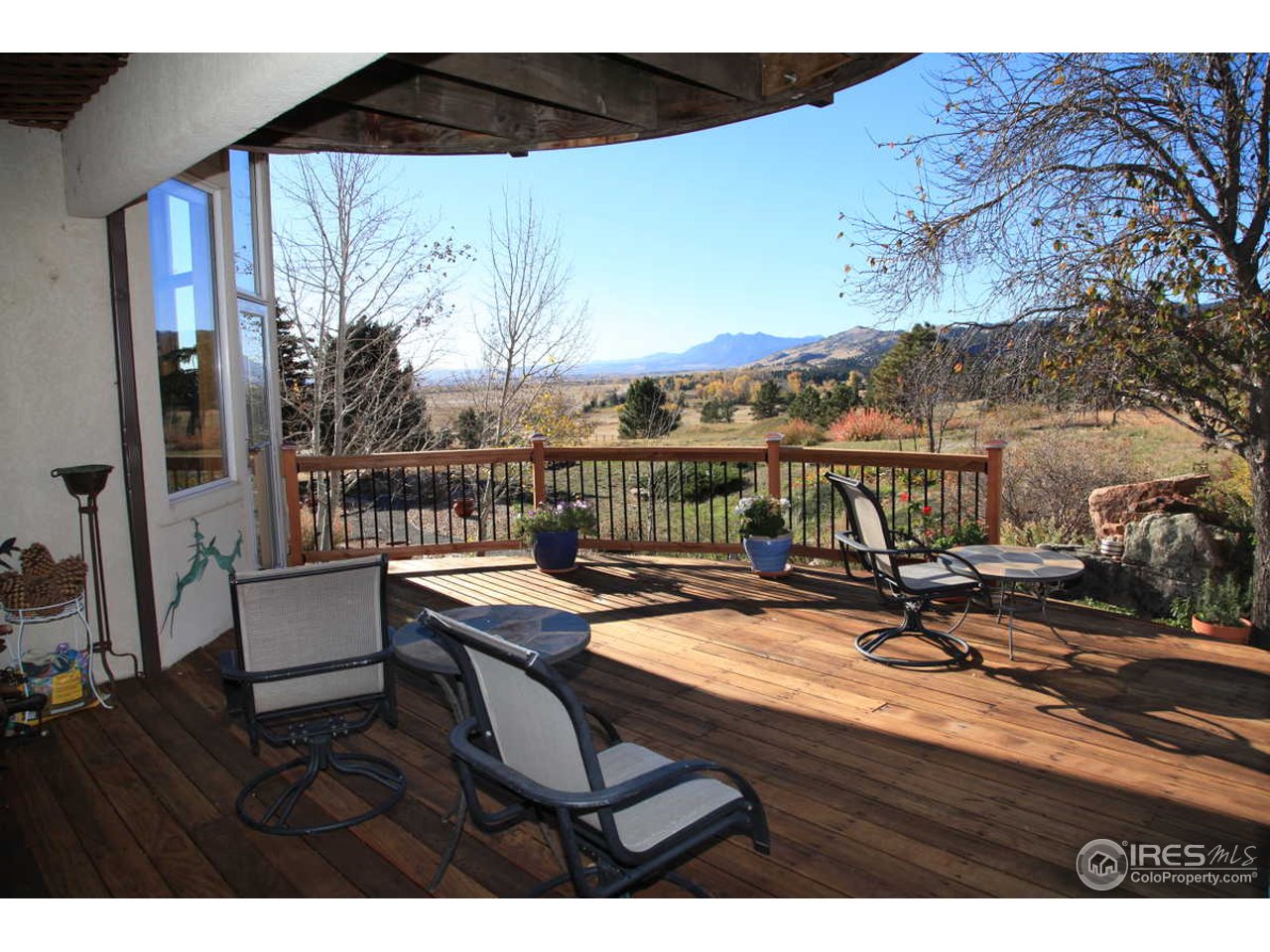 3061 Foothills Ranch Drive Boulder, CO 80302 - Photo 17 of 19 a view of a terrace with furniture