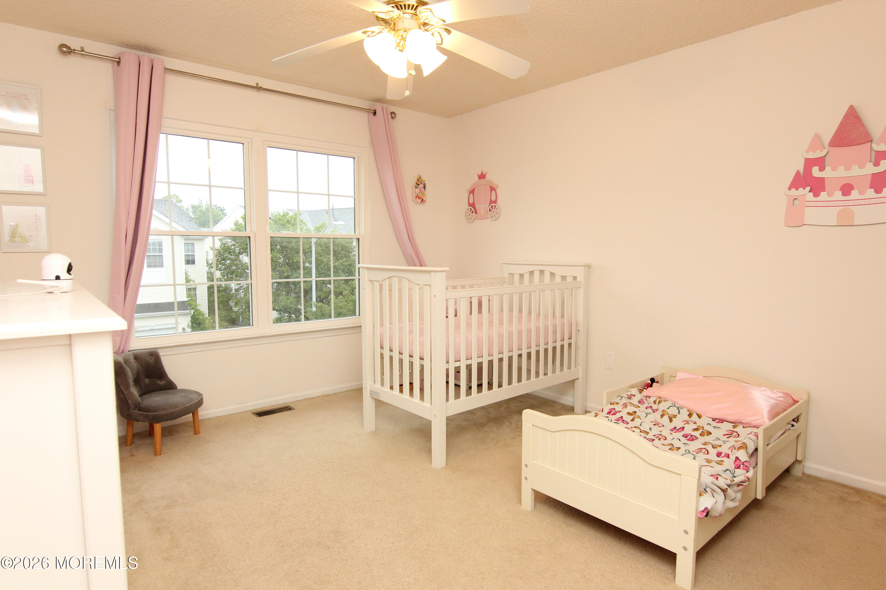 33 Austin Street Tinton Falls, NJ 07712 - Photo 20 of 46 a bed room with a bed and a window