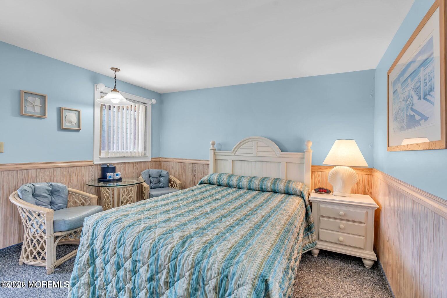 1008 Ocean Avenue Point Pleasant, NJ 08742 - Photo 13 of 29 a bedroom with two beds and painting on the wall