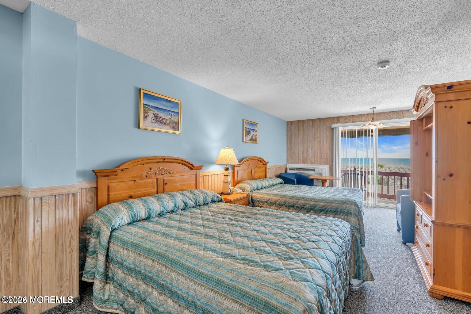 1008 Ocean Avenue Point Pleasant, NJ 08742 - Photo 14 of 29 a bedroom with bed and a window