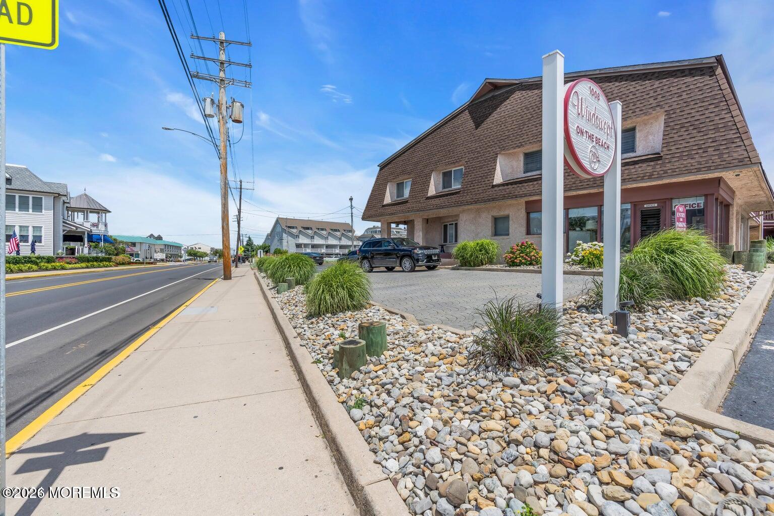 1008 Ocean Avenue Point Pleasant, NJ 08742 - Photo 2 of 29 a front view of a house with garden