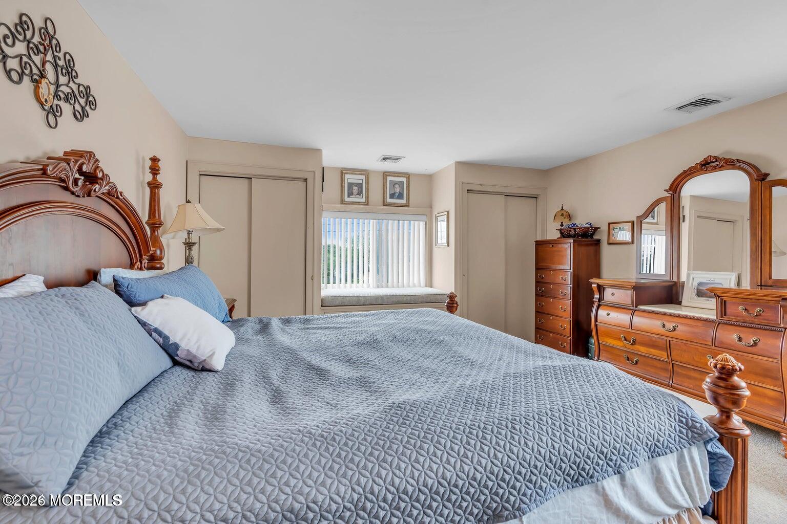 1008 Ocean Avenue Point Pleasant, NJ 08742 - Photo 26 of 29 a bed room with a bed and a couch