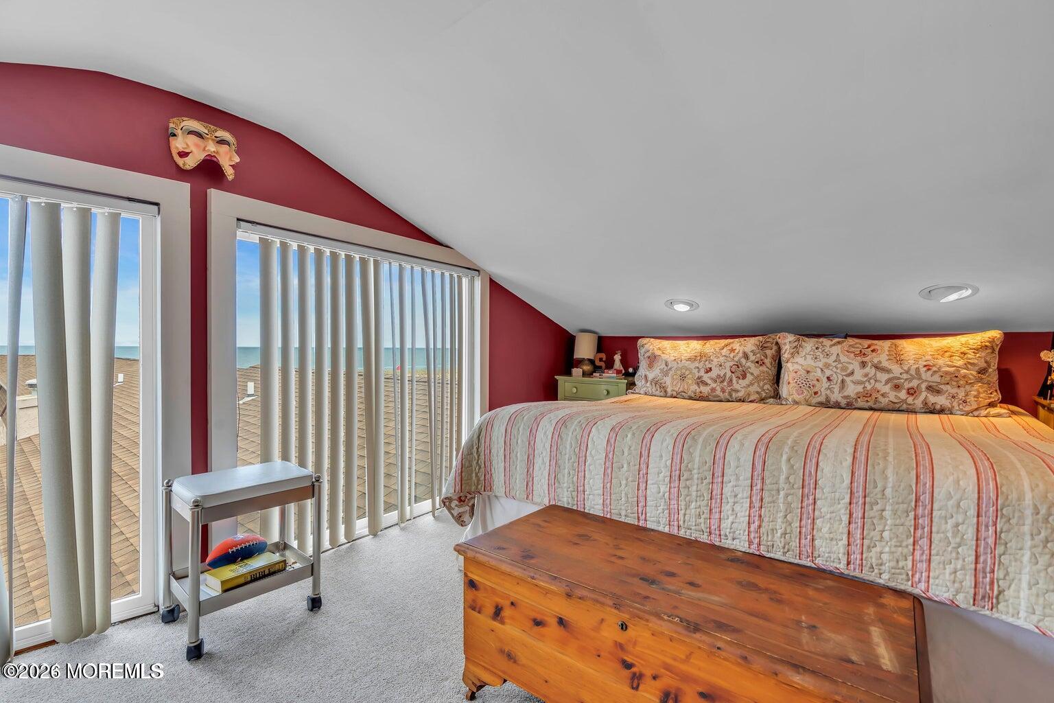1008 Ocean Avenue Point Pleasant, NJ 08742 - Photo 28 of 29 a bedroom with a bed and window