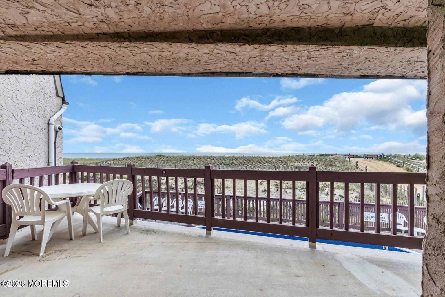 1008 Ocean Avenue Point Pleasant, NJ 08742 - Photo 3 of 29 a view of a terrace with chairs