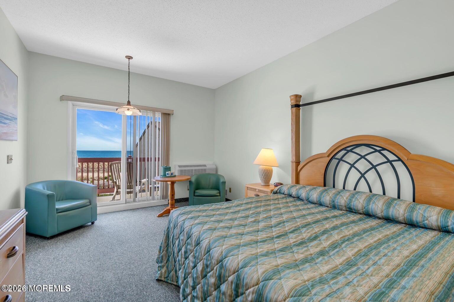 1008 Ocean Avenue Point Pleasant, NJ 08742 - Photo 5 of 29 a bedroom with a bed dresser and a window