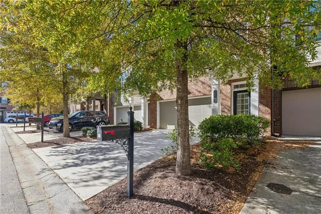 a view of a backyard with sitting area and furniture