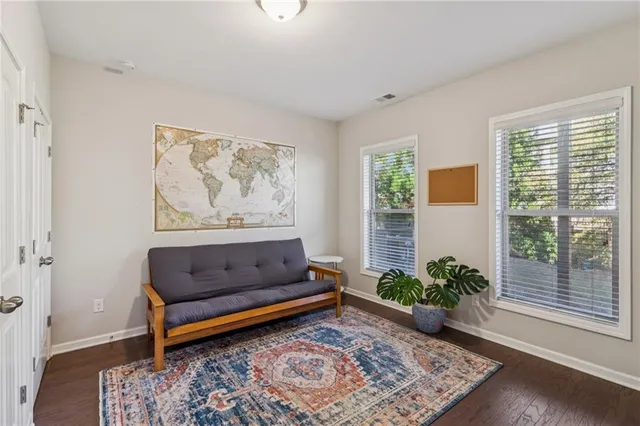 a view of a hallway with a outdoor space