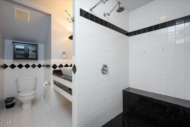 a bathroom with a sink and a toilet