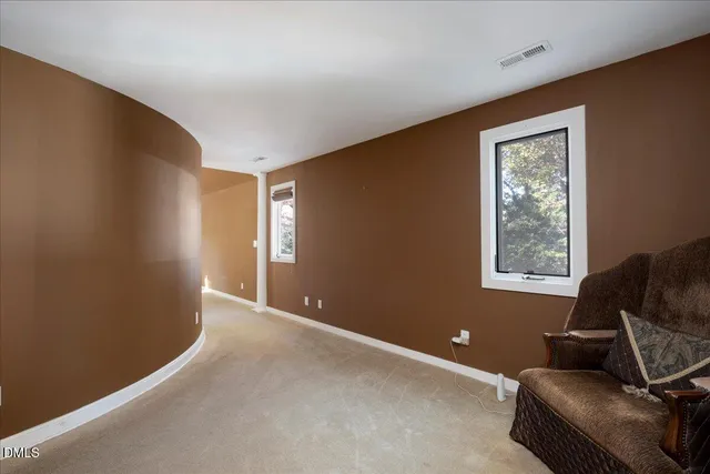 a view of livingroom with workspace