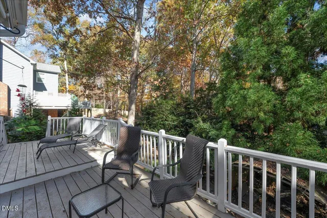 a view of a two chairs on the roof deck
