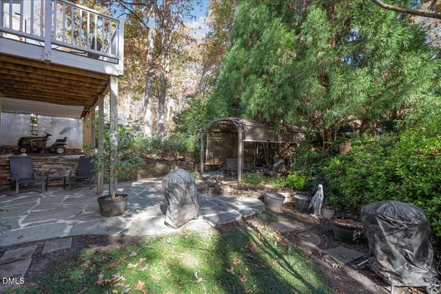 a backyard of a house with seating space