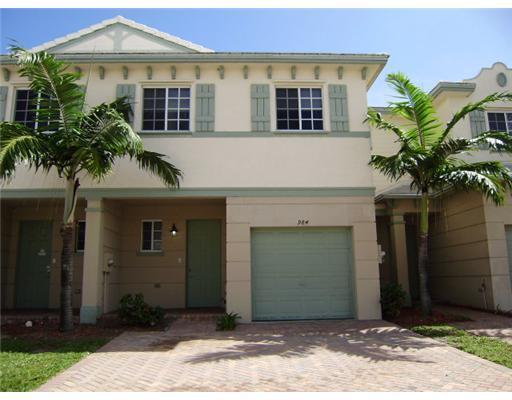 969 Tortuga Lane Riviera Beach, FL 33404 - Photo 1 of 20 Front