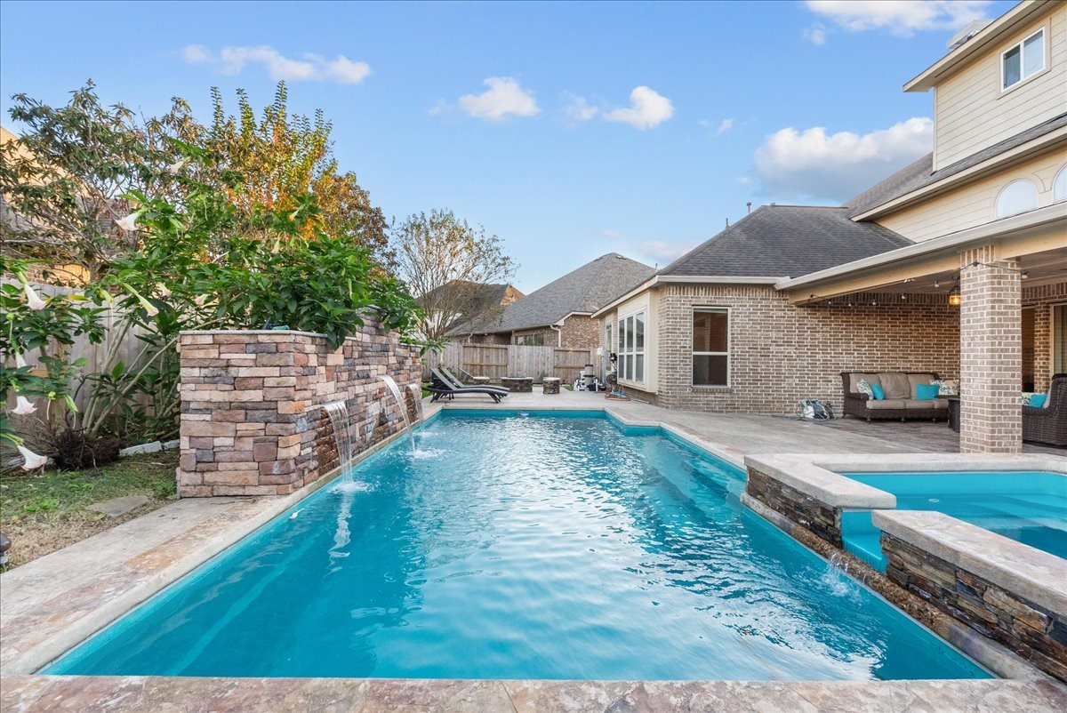 1358 Porta Rosa Lane League City, TX 77573 - Photo 2 of 48 Vacation 365 days a year in this backyard oasis