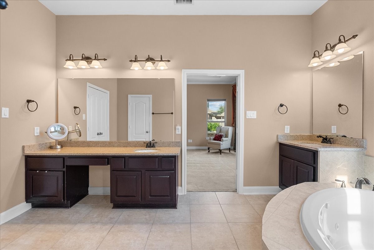 1358 Porta Rosa Lane League City, TX 77573 - Photo 21 of 48 Primary en-suite bath features a walk-in shower, soaking tub, dual vanities and a walk-in closet