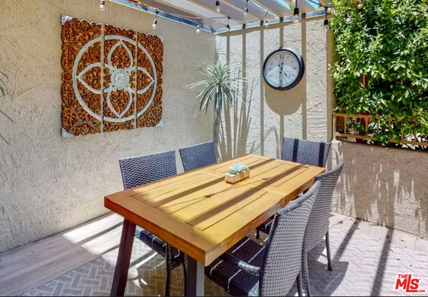 a view of a table and chairs in a room
