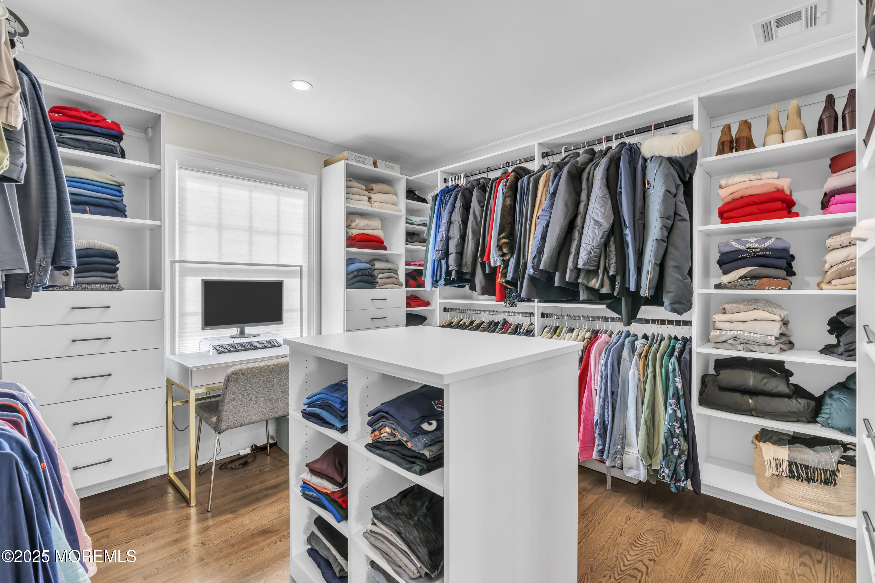 150 Hance Road Fair Haven, NJ 07704 - Photo 19 of 35 a view of walk in closet with clothes and shoes