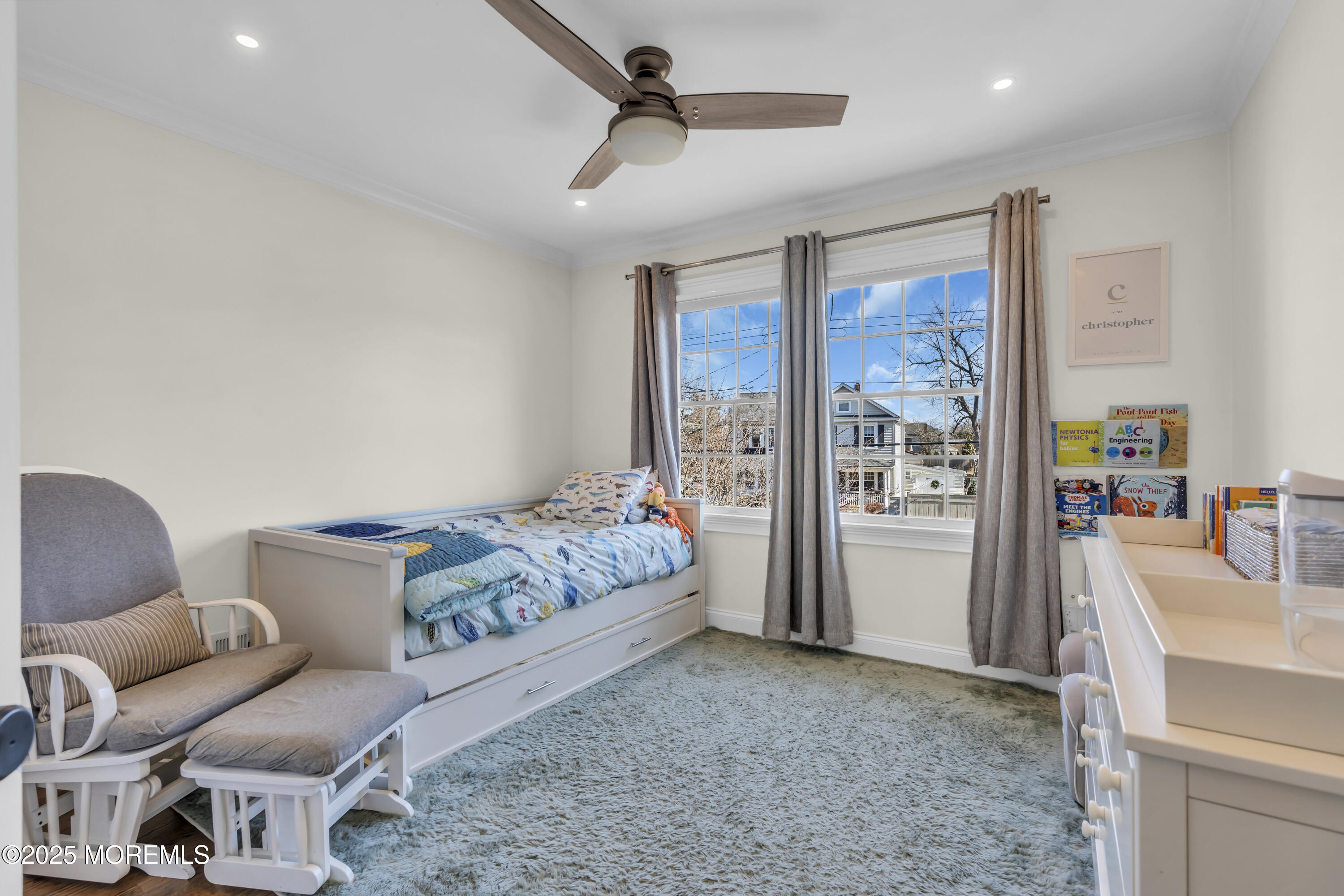150 Hance Road Fair Haven, NJ 07704 - Photo 20 of 35 a bedroom with furniture and a chandelier