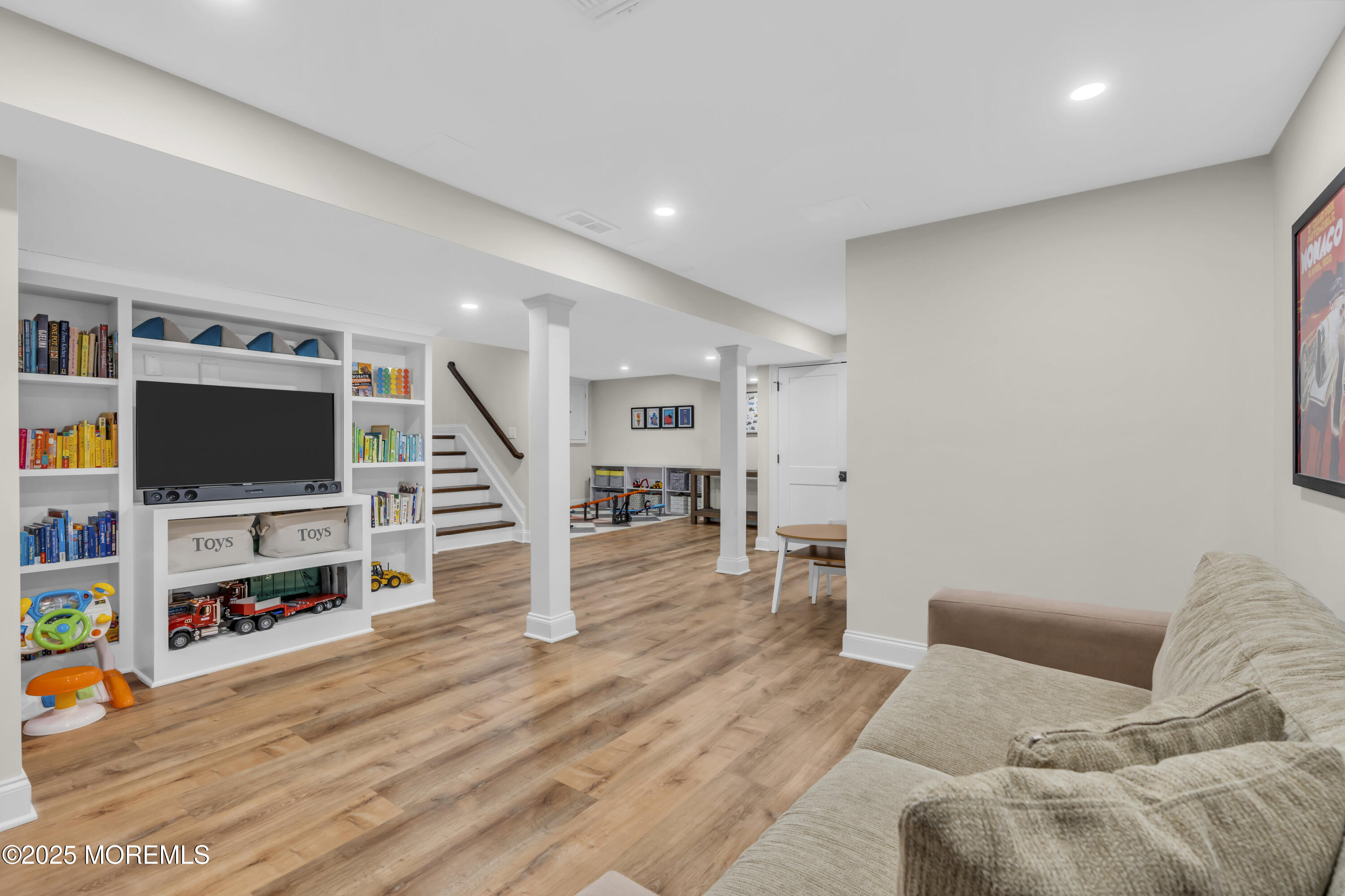 150 Hance Road Fair Haven, NJ 07704 - Photo 25 of 35 a living room with furniture and a flat screen tv