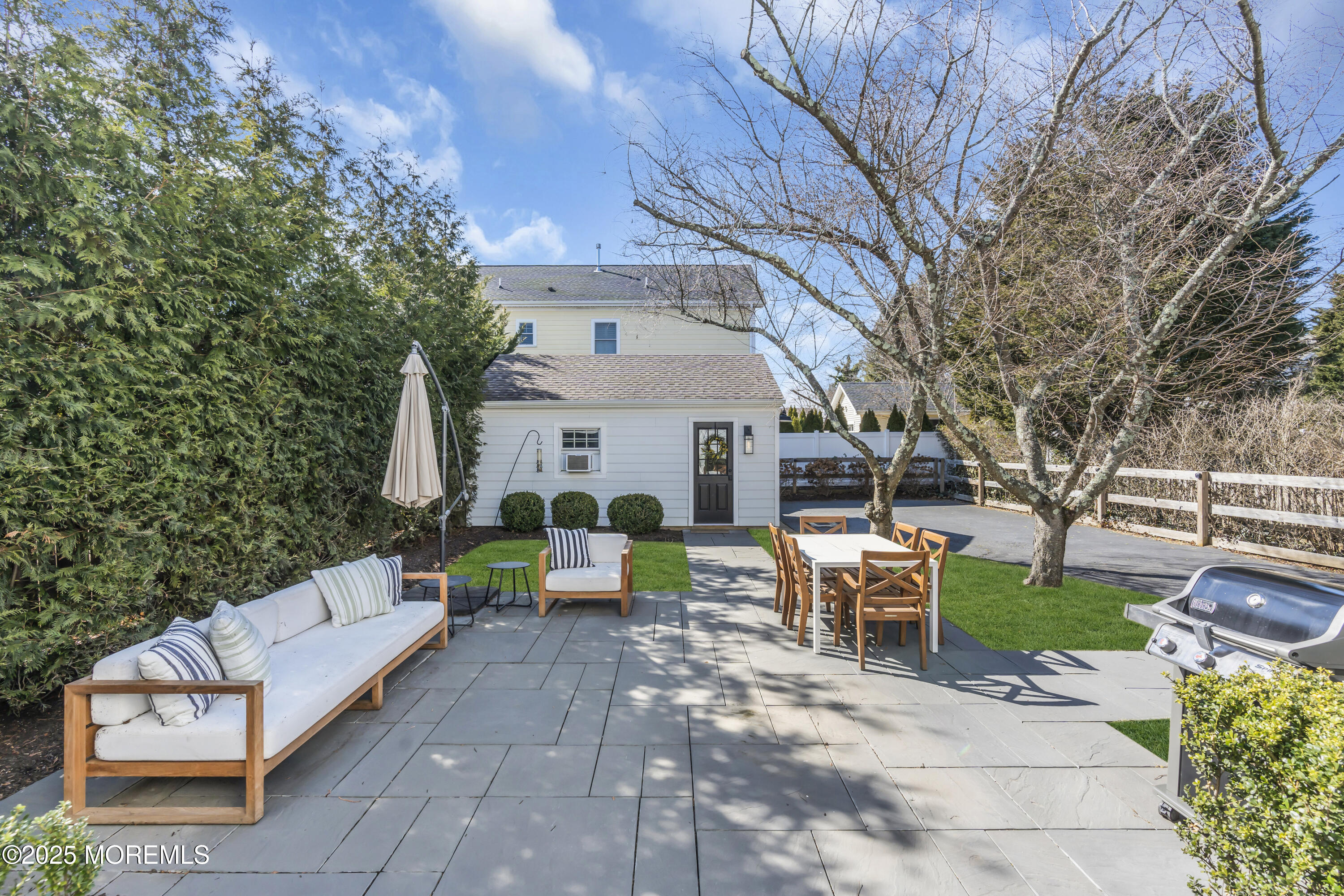 150 Hance Road Fair Haven, NJ 07704 - Photo 30 of 35 a view of a patio with a table and chairs
