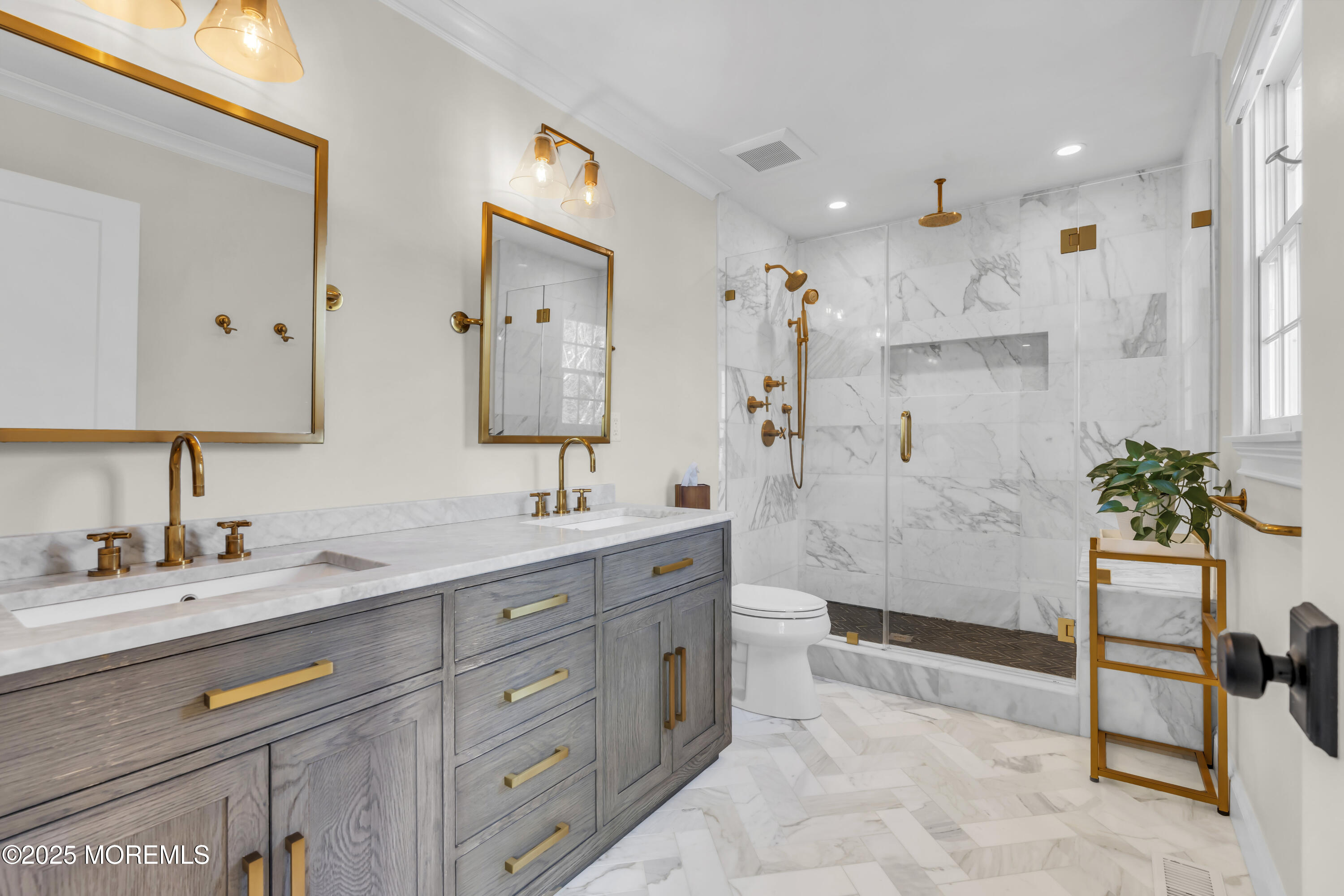 150 Hance Road Fair Haven, NJ 07704 - Photo 4 of 35 a spacious bathroom with a double vanity sink a toilet a mirror and shower