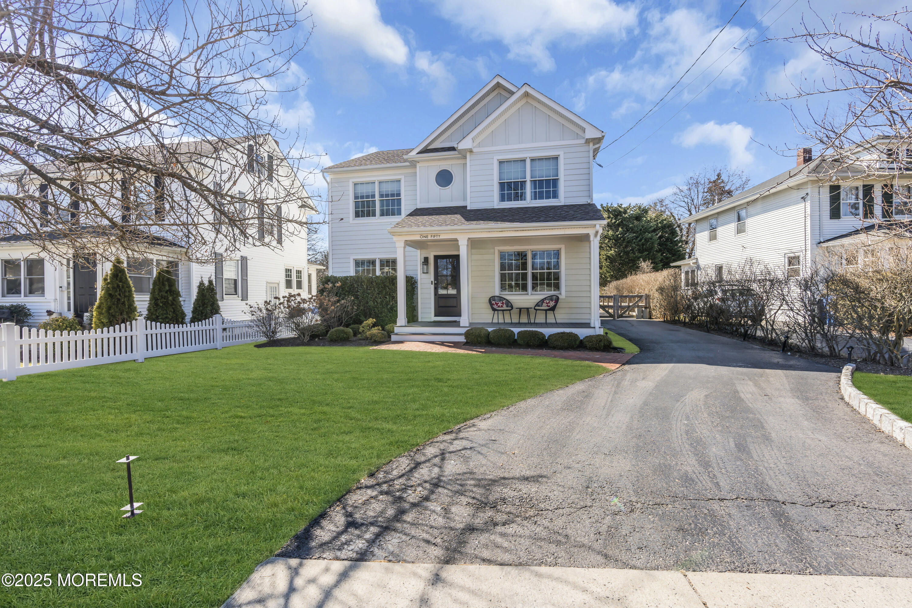 150 Hance Road Fair Haven, NJ 07704 - Photo 7 of 35 a front view of a house with a yard and trees