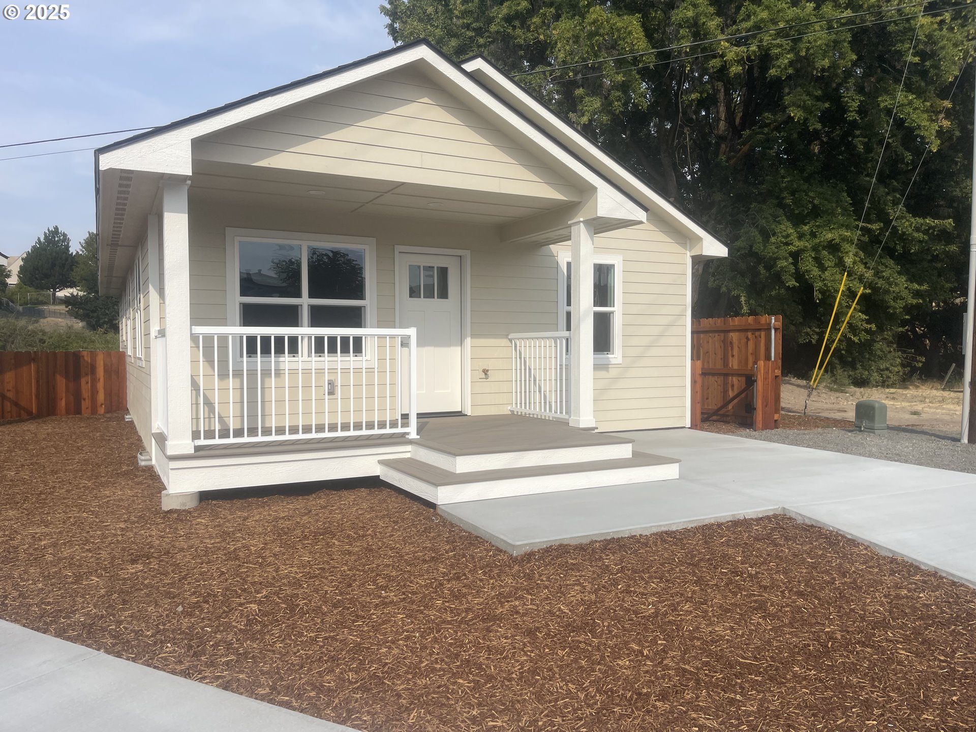 300 North Chase Street Heppner, OR 97836 - Photo 1 of 12 a front view of a house with a garage