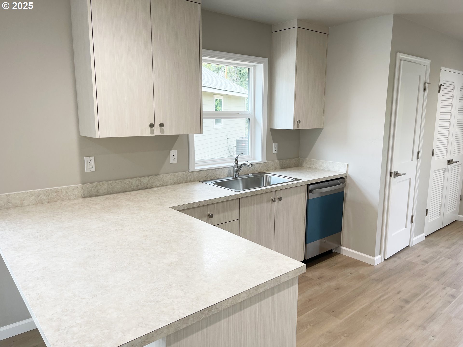 300 North Chase Street Heppner, OR 97836 - Photo 3 of 12 a kitchen with a sink cabinets and window