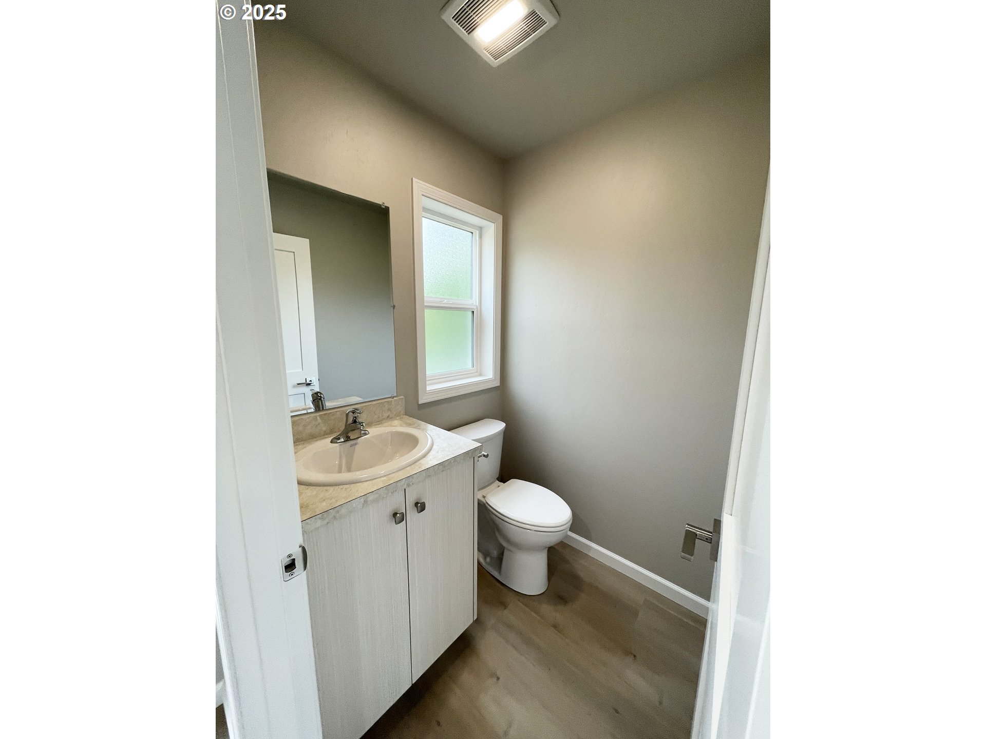 300 North Chase Street Heppner, OR 97836 - Photo 6 of 12 a bathroom with a sink and a mirror
