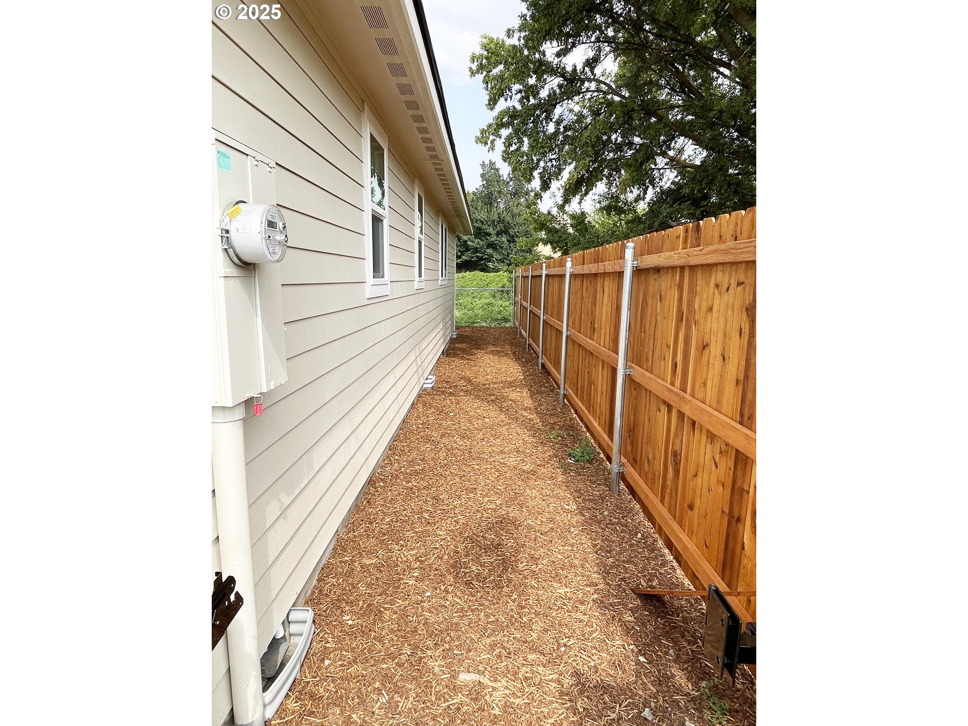 300 North Chase Street Heppner, OR 97836 - Photo 10 of 12 a view of a pathway of a house with wooden floor