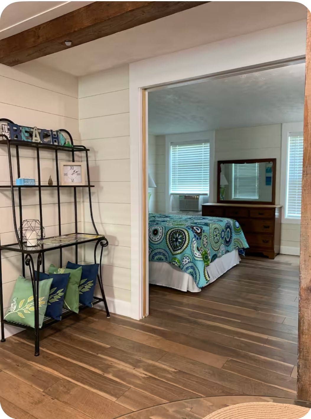 911 11th Street, Unit 2 Galveston, TX 77550 - Photo 11 of 20 a room with a couch and a table in it