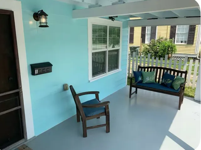 a view of porch with a bench