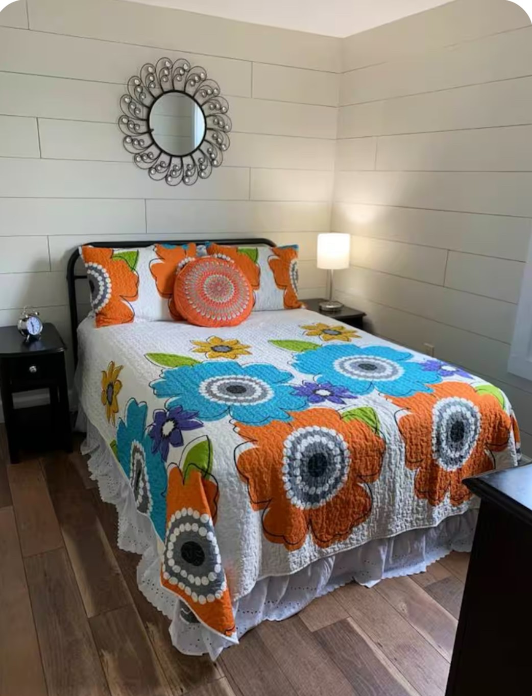 911 11th Street, Unit 2 Galveston, TX 77550 - Photo 7 of 20 a bedroom with a bed and painting on the wall