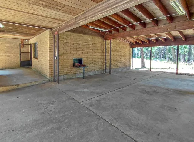a backyard of a house with lots of green space