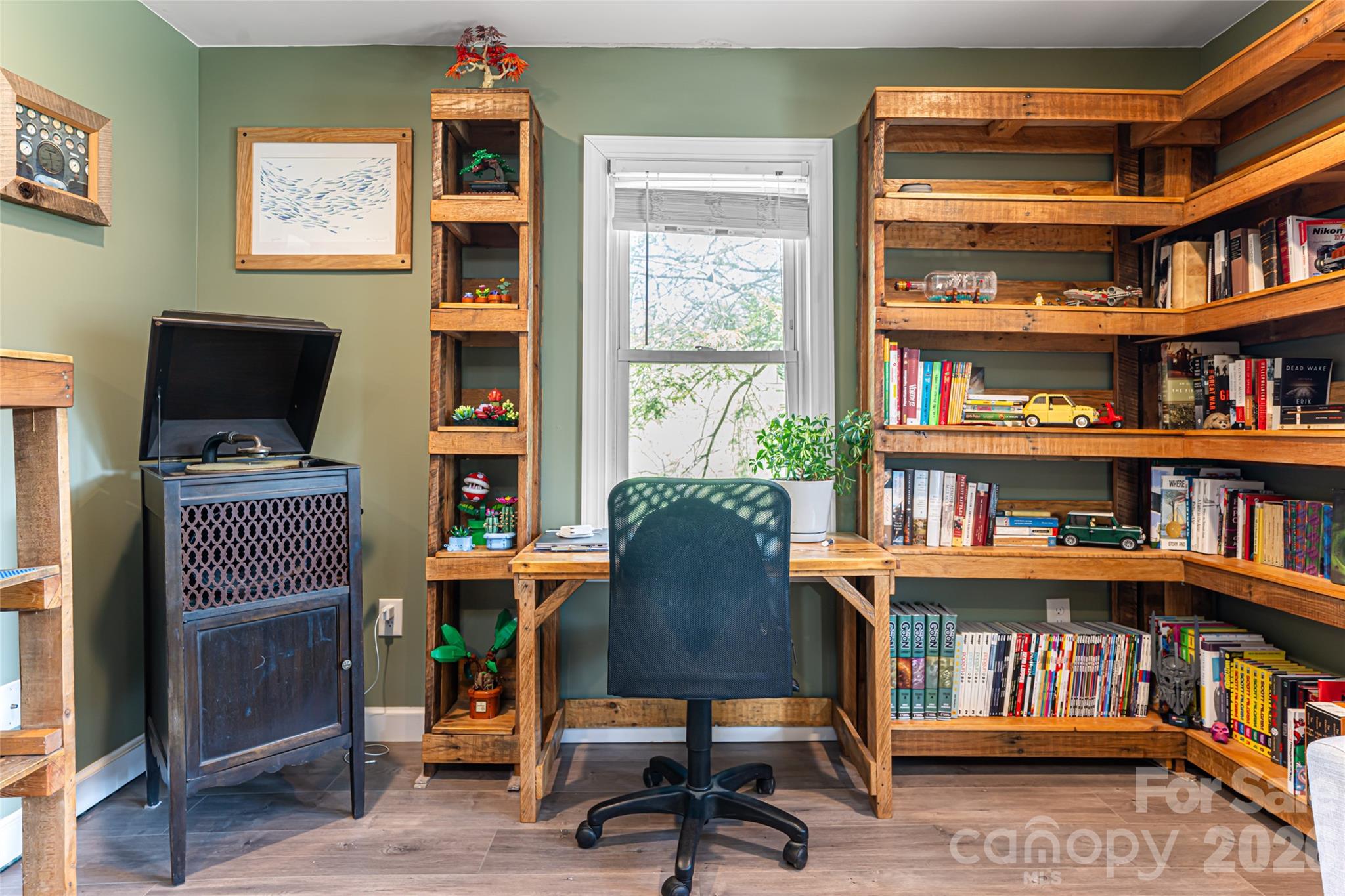 86 Rolling Hills Road Canton, NC 28716 - Photo 23 of 48 a workspace with furniture book shelves