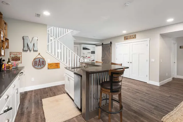 a view of a kitchen and dining room
