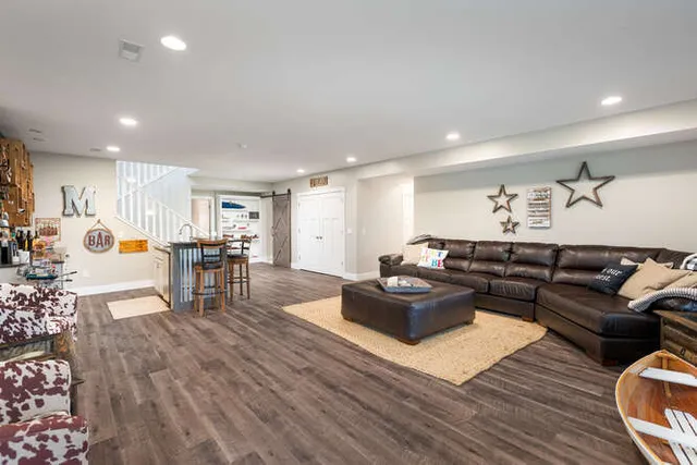 a living room with furniture and a table