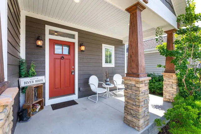 a backyard of a house with seating space