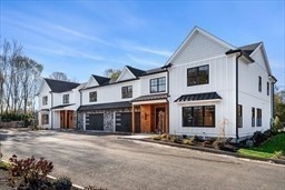 8 Orchard Road, Unit B Gloucester, MA 01930 - Photo 2 of 8 a front view of a house with a yard
