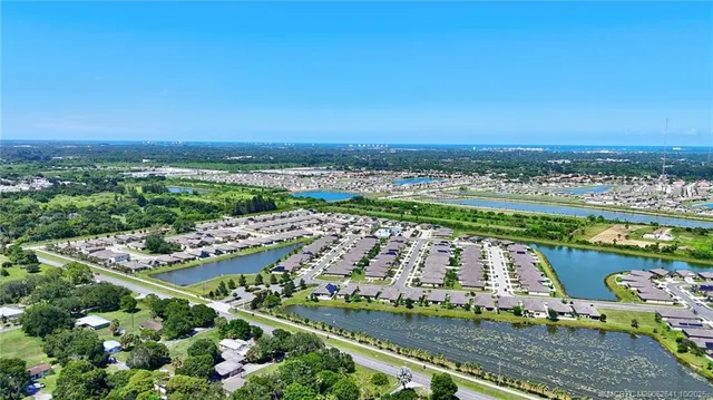 a view of a city with an ocean