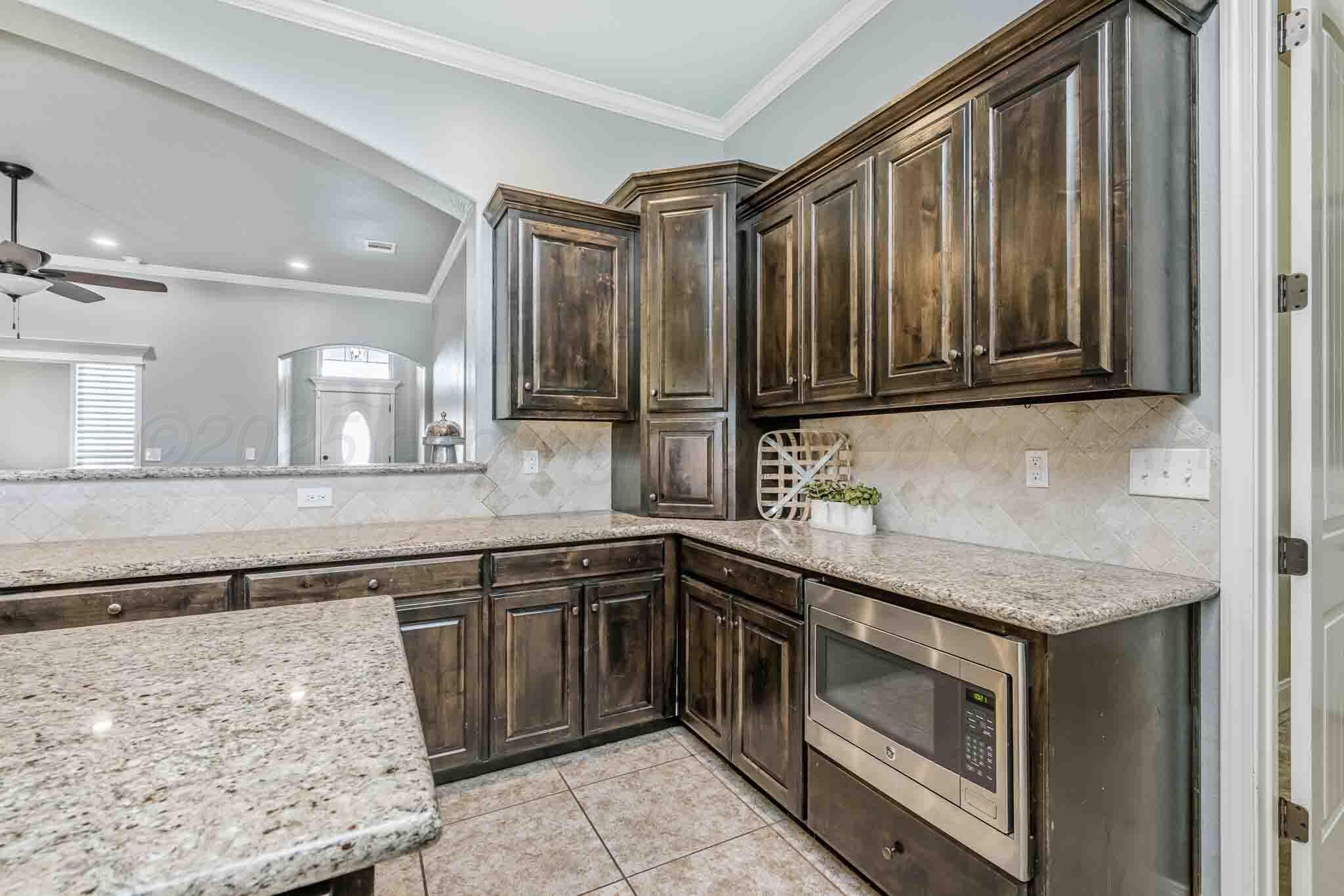 6 Cody Lane Canyon, TX 79015 - Photo 11 of 23 a kitchen that has a sink and a stove in it