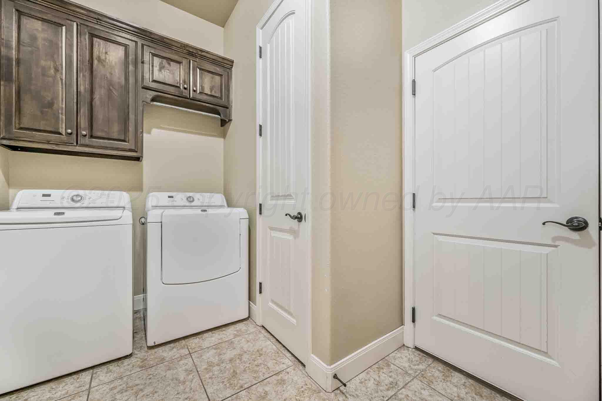 6 Cody Lane Canyon, TX 79015 - Photo 13 of 23 a utility room with dryer and washer