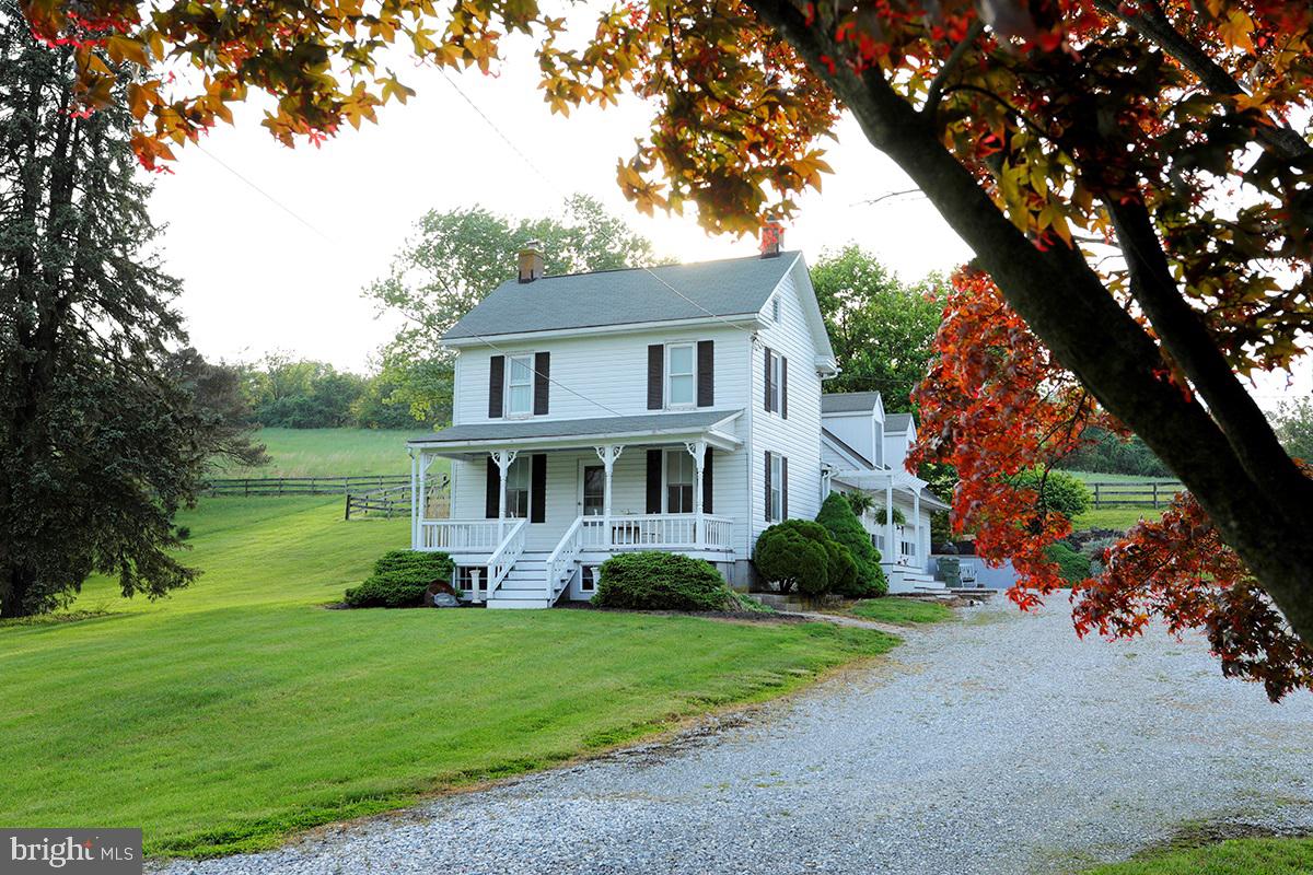 1758 Manchester Road Westminster, MD 21157 - Photo 2 of 19 Charming Farm house with a warm setting!