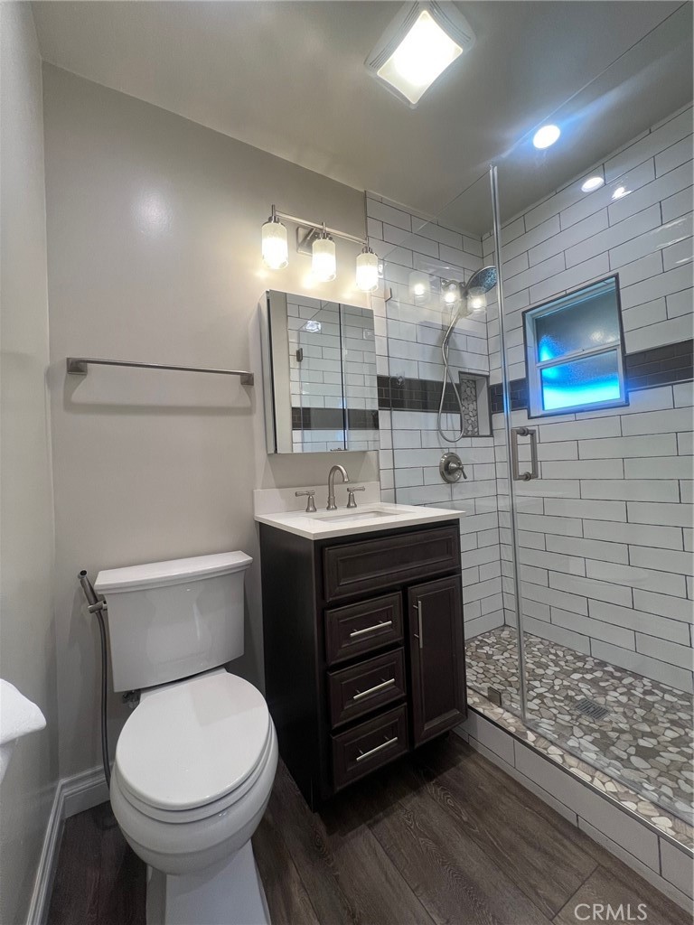 115 North Berkeley Avenue Fullerton, CA 92831 - Photo 8 of 14 a bathroom with a sink toilet and shower