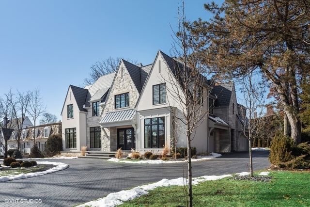 744 Taft Road Hinsdale, IL 60521 - Photo 2 of 37 a view of a white house with a large windows and a yard