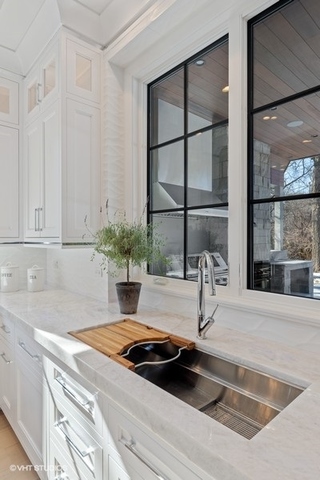 744 Taft Road Hinsdale, IL 60521 - Photo 14 of 37 a kitchen with a sink and a window