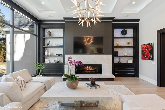 744 Taft Road Hinsdale, IL 60521 - Photo 19 of 37 a living room with furniture and a flat screen tv