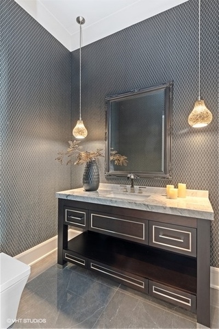 744 Taft Road Hinsdale, IL 60521 - Photo 20 of 37 a bathroom with a sink a light fixture and a mirror