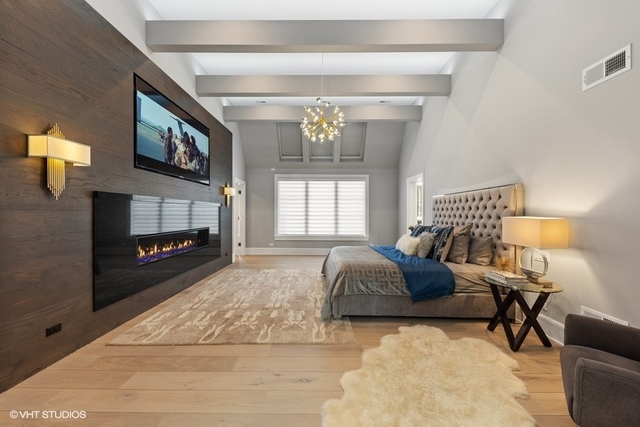 744 Taft Road Hinsdale, IL 60521 - Photo 23 of 37 a living room with furniture and a fireplace