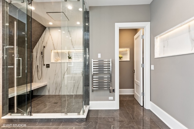 744 Taft Road Hinsdale, IL 60521 - Photo 28 of 37 a view of a hallway with wooden floor and glass door