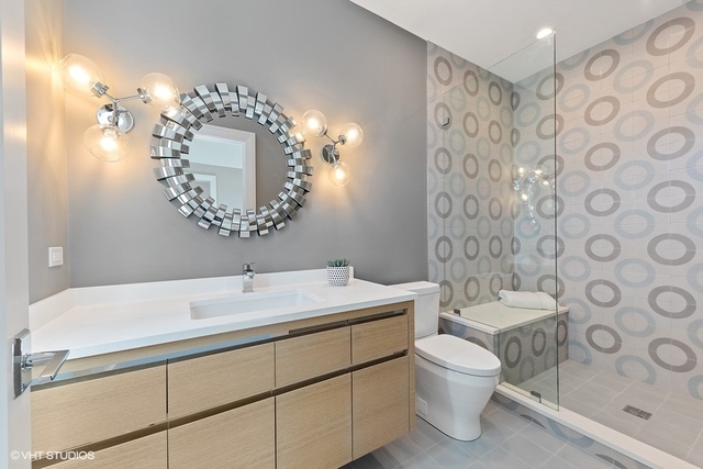 744 Taft Road Hinsdale, IL 60521 - Photo 29 of 37 a bathroom with a sink a toilet and shower curtain